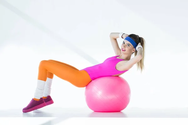 Sporty Young Woman Doing Abs Fit Ball Smiling Camera Grey — Free Stock Photo