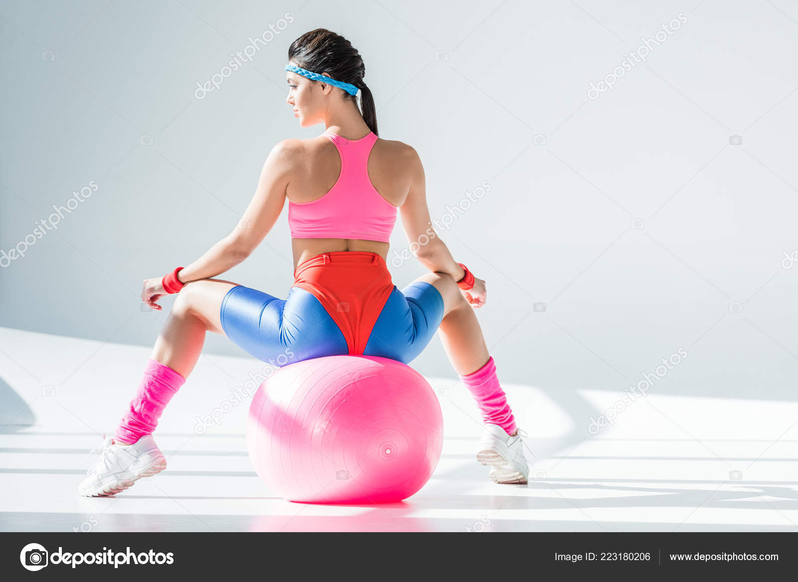 Back View Athletic Young Woman Sitting Exercising Fitness Ball