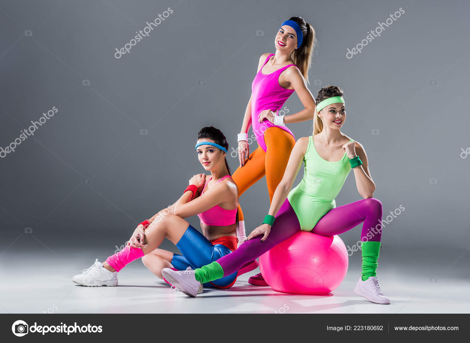 Beautiful Athletic Women 80S Style Sportswear Posing Together Grey Stock  Photo by ©EdZbarzhyvetsky 223180692