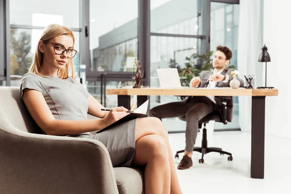 Businesswoman Notebook Looking Camera While Sitting Armchair Colleague Workplace Office — Stock Photo, Image