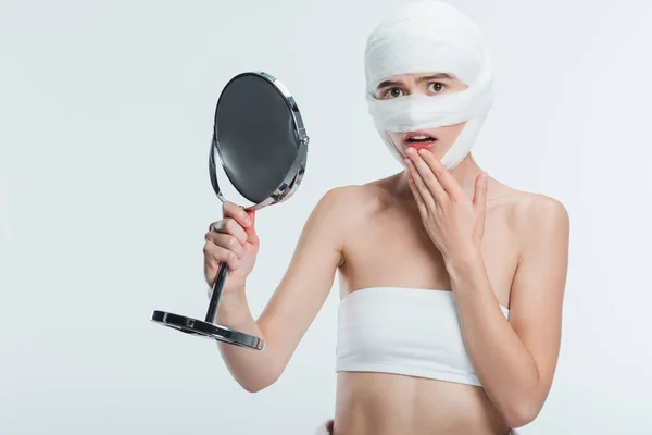 Frightened Woman Bandages Holding Mirror Isolated White — Stock Photo, Image