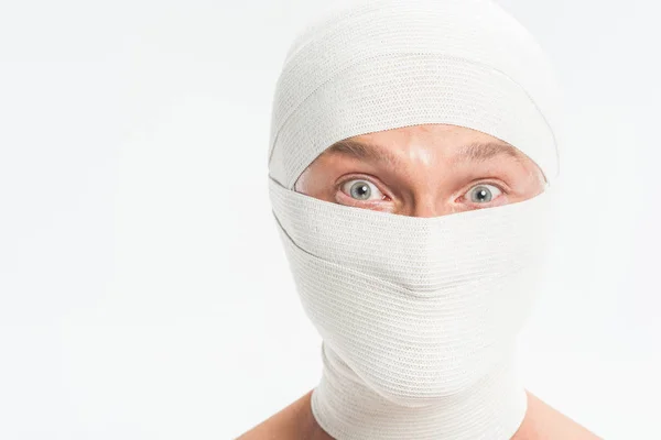 Close Man Face Covered White Bandages Plastic Surgery Isolated White — Free Stock Photo