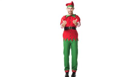 Noel elf kostümü uzanmış eller ile jest izole üzerinde beyaz adam gülümseyen