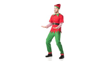 cheerful man in christmas elf costume outstreching hands in excitement isolated on white clipart