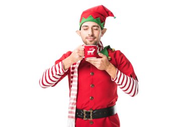 adam Noel elf kostümü ile çay tutarak ve üzerinde beyaz izole kokusu teneffüs edilmesi gözleri kapalı