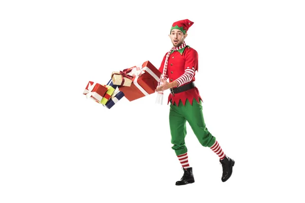 Surprised Man Christmas Elf Costume Accidentally Dropping Pile Presents Isolated — Stock Photo, Image