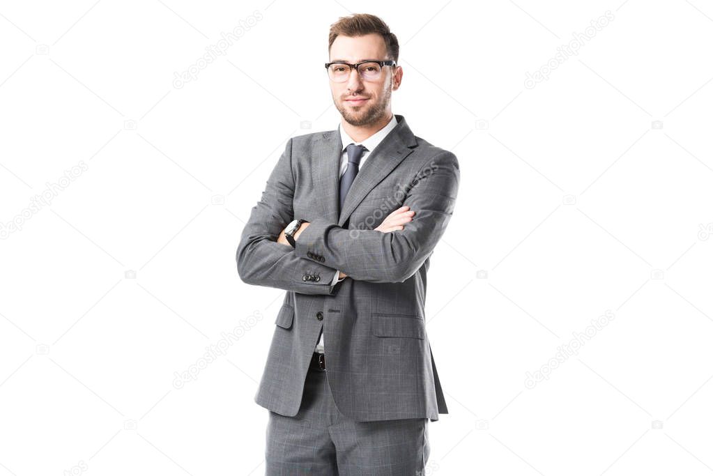 adult businessman in suit with arms crossed isolated on white