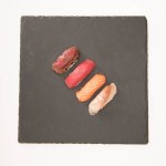 Top view of sashimi sushi on grey slate