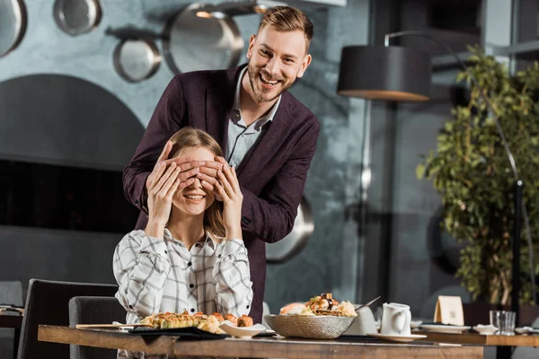 Handsome Man Closing Eyes His Girlfriend Make Surprise Restaurant — Stock Photo, Image