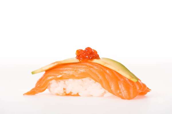 Nigiri sushi with salmon, caviar and avocado isolated on white
