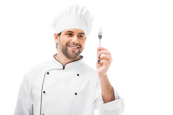 快乐的年轻厨师拿着叉子孤立在白色 — 免费的图库照片