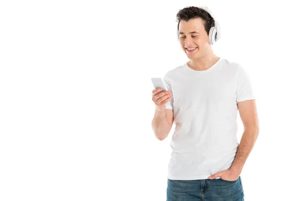 Όμορφος Άνδρας Στα Ακουστικά Χρησιμοποιώντας Smartphone Που Απομονώνονται Λευκό — Δωρεάν Φωτογραφία