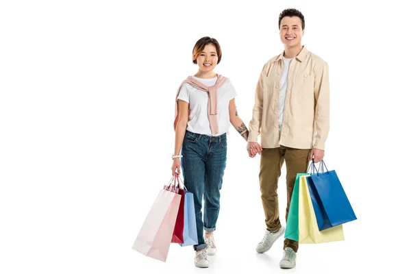 Feliz Pareja Cogida Mano Llevando Bolsas Aisladas Blanco —  Fotos de Stock