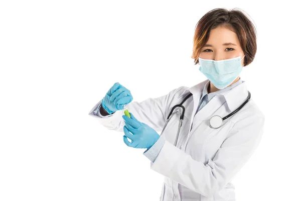 Female Doctor Stethoscope Medical Mask Holding Ampule Looking Camera Isolated — Free Stock Photo