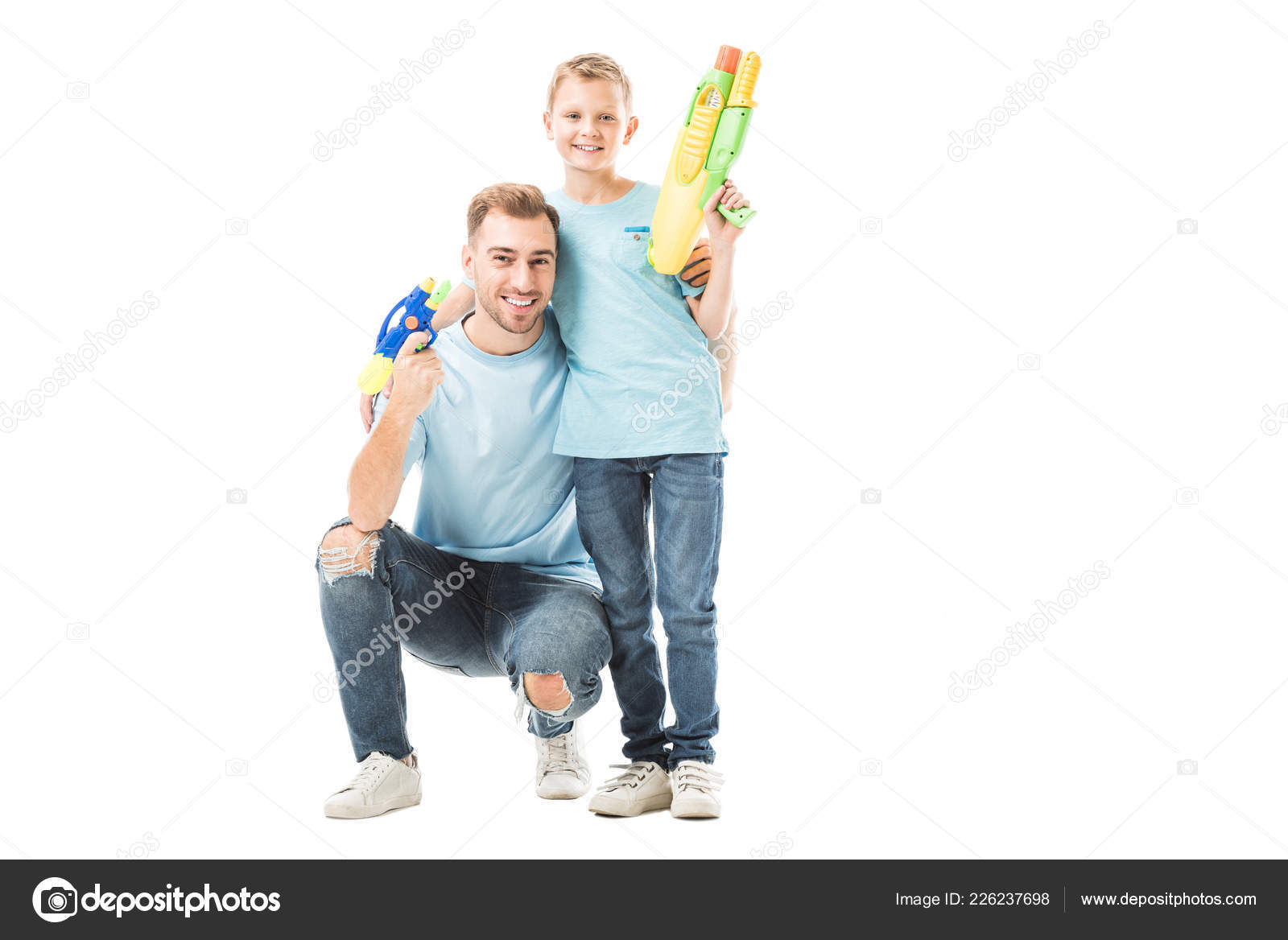 Photo White Dad Dad Son Holding Water Guns Smiling Isolated