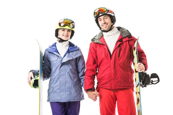 Couple Ski Suits Snowboards Holding Hands Smiling Looking Camera Isolated — Free Stock Photo