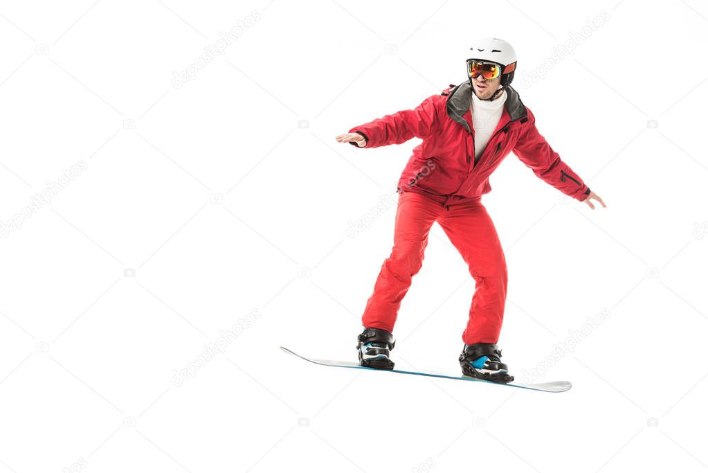 adult man in ski clothes snowboarding isolated on white