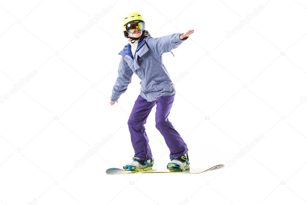 adult woman in ski clothes snowboarding isolated on white