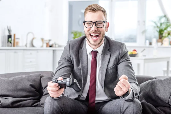 Excited Businessman Holding Console Playing Video Game Home — Stock Photo, Image