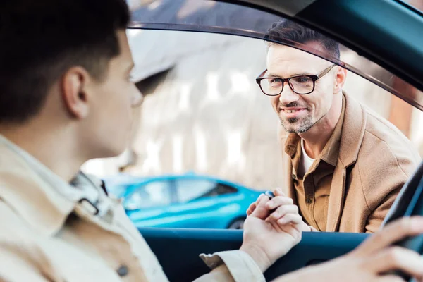 Selective Focus Handsome Father Giving Car Key Teen Son Street — Stock Photo, Image