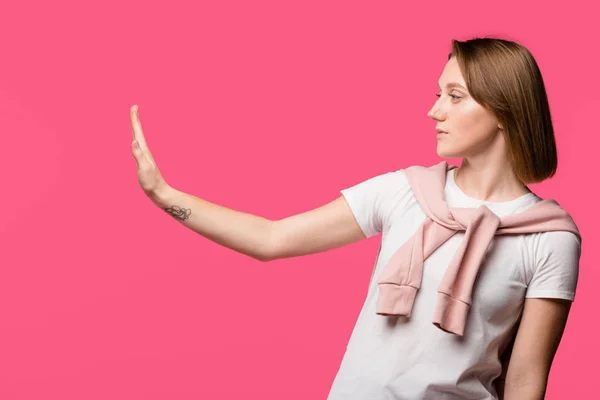 Side View Young Woman Showing Stop Gesture Isolated Pink — Free Stock Photo