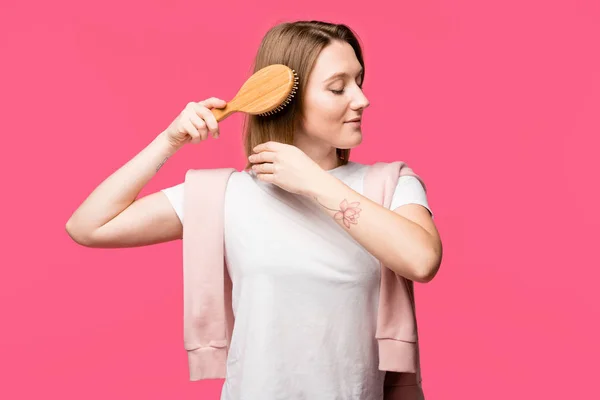 Young Beautiful Woman Brushing Hair Isolated Pink — Stock Photo, Image