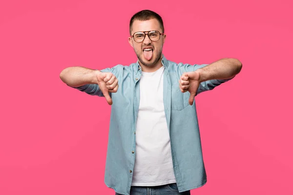 Emotional Man Showing Thumbs Tongue Out Isolated Pink — Stock Photo, Image