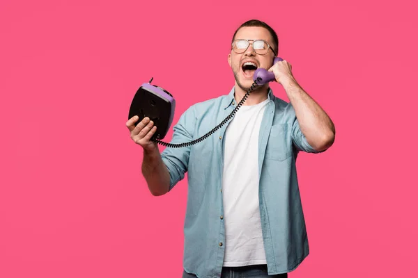 Excited Young Man Eyeglasses Talking Vintage Telephone Isolated Pink — Stock Photo, Image