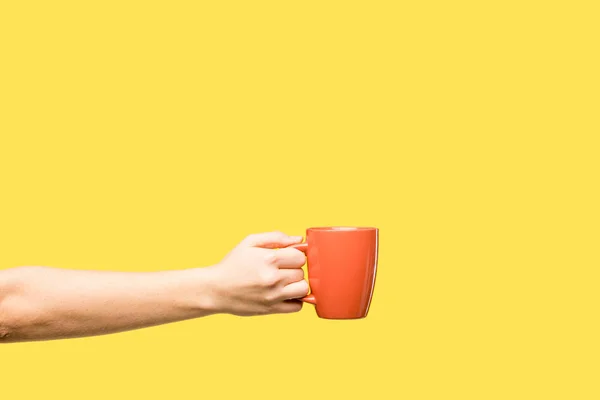 Cropped Shot Person Holding Red Cup Isolated Yellow — Stock Photo, Image