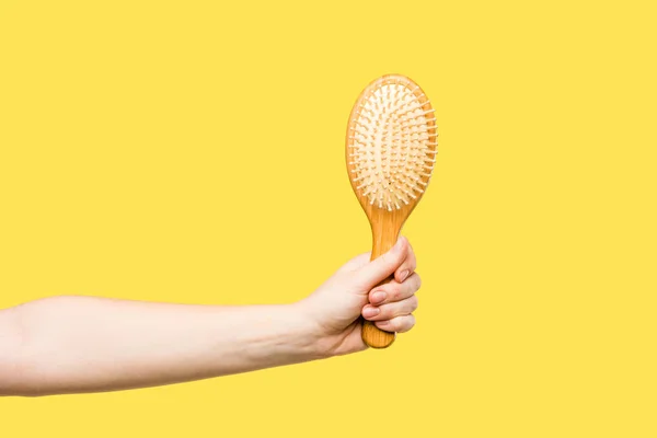 Cropped Shot Person Holding Hairbrush Isolated Yellow — Stock Photo, Image