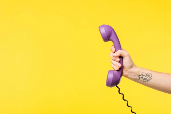 Cropped Shot Person Holding Purple Handset Isolated Yellow — Stock Photo, Image