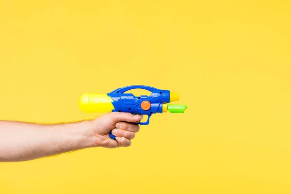 Uma Arma Colorida Da Mão Da Pistola Do Brinquedo Foto de Stock - Imagem de  revestimentos, fundo: 121015934