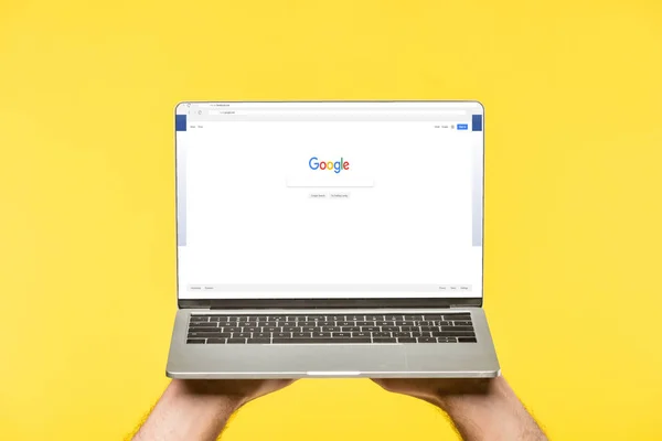 Cropped Shot Person Holding Laptop Google Website Screen Isolated Yellow — Stock Photo, Image