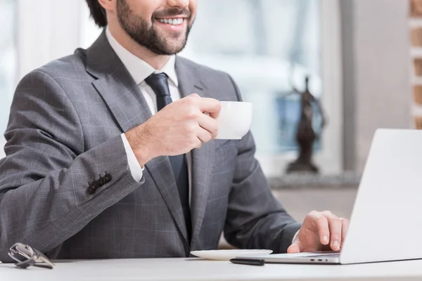 Cropped View Smiling Businessman Drinking Coffee Typing Laptop Keyboard Table — Stock Photo, Image