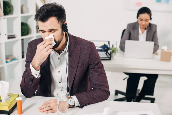 Sick Call Center Operator Napkin Blowing Nose Coworker Background — Stock Photo, Image