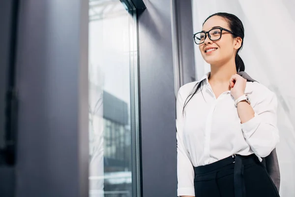Pretty Businesswoman Looking Window Smiling Office — Free Stock Photo
