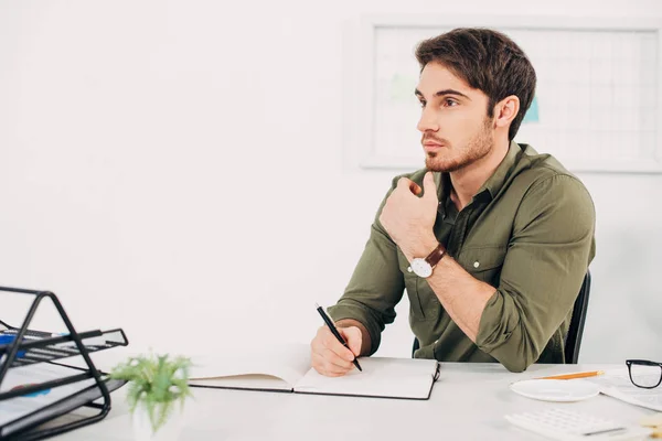 Businessman Sitting Desk Thinking Pen Hand — Stock Photo, Image