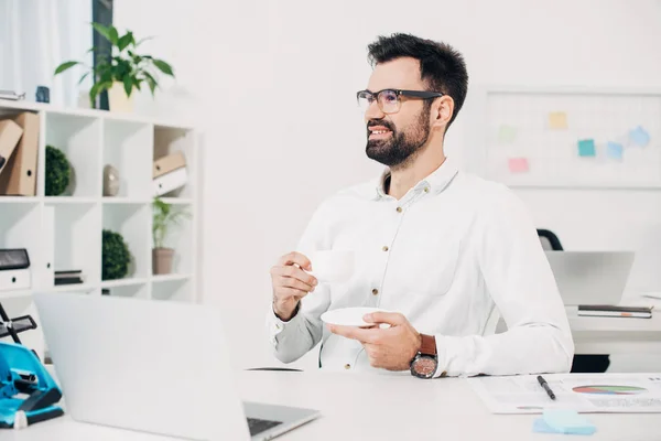 Businessman Sitting Glasses Drinking Coffee Office — Free Stock Photo