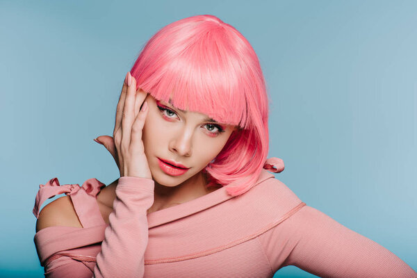 Attractive young woman posing in pink wig isolated on blue — Stock Image Attractive Young Woman Posing Pink Wig Isolated Blue Royalty Free Stock Images