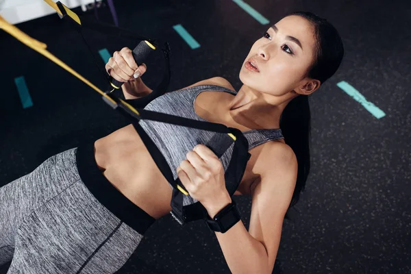 Close View Attractive Asian Sportswoman Exercising Resistance Bands Gym — Stock Photo, Image