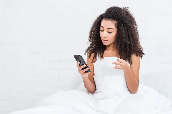 Curly Girl Coffee Cup Using Smartphone Bed Morning Time Home — Free Stock Photo