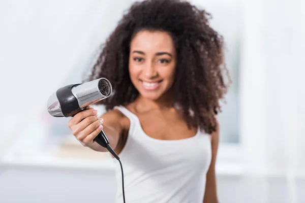 Selective Focus African American Girl Holding Hair Dryer Home — Stock Photo, Image