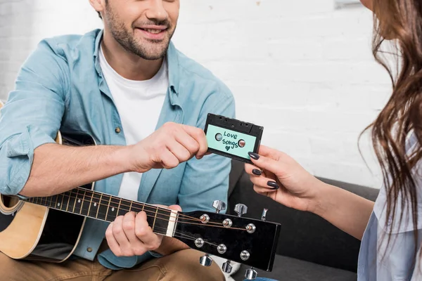 Partial View Man Acoustic Guitar Sitting Couch Giving Vintage Audio — Stock Photo, Image