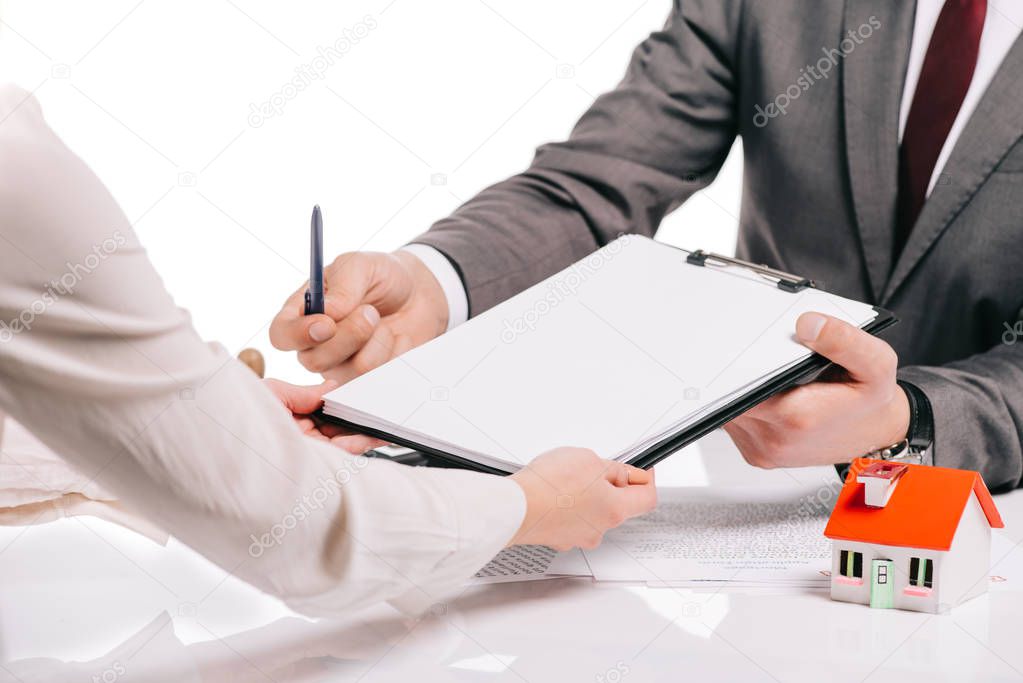 cropped view of mortgage broker and woman making deal isolated on white, mortgage concept