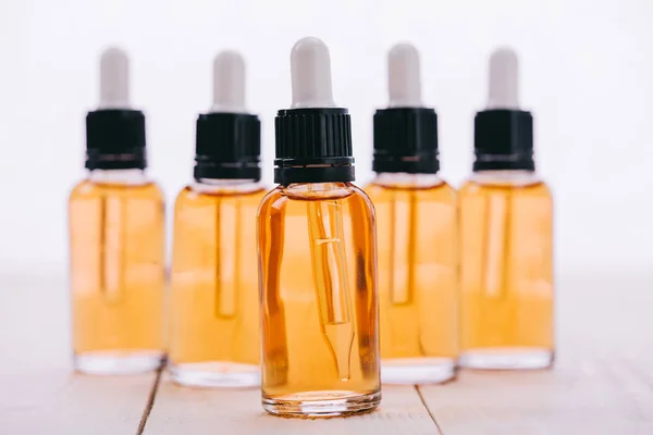 Selective Focus Cbd Oil Bottle Dropper Wooden Surface Isolated White — Stock Photo, Image