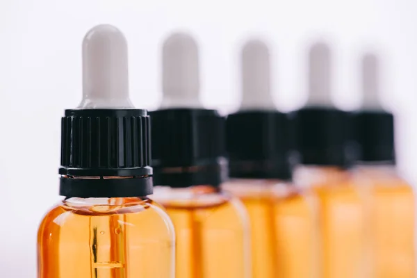 Selective Focus Cannabidiol Oil Bottles Droppers Wooden Surface Isolated White — Stock Photo, Image