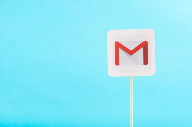 top view of gmail icon isolated on blue with copy space clipart