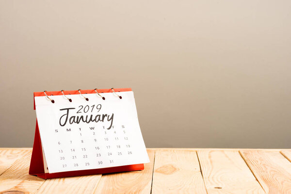 calendar with 'january 2019' lettering isolated on beige with copy space