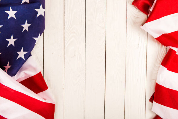 american flag on wooden background with copy space