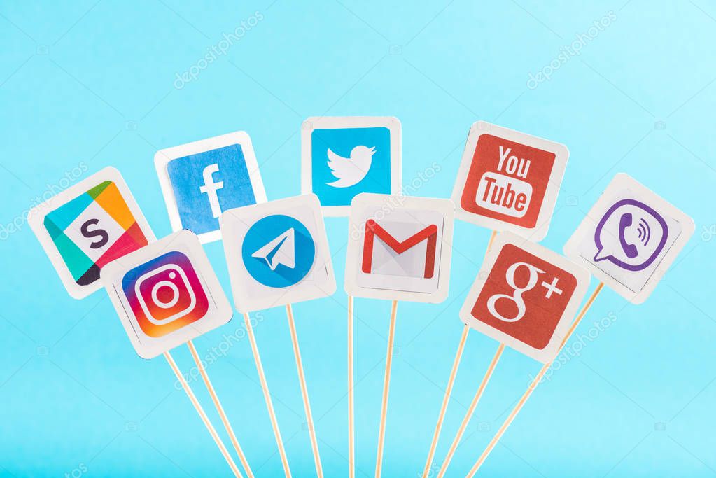 Top view of social media icons isolated on blue